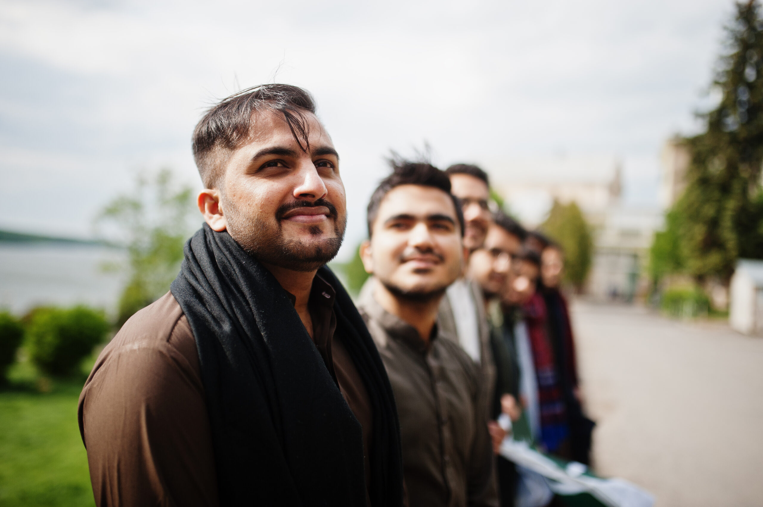 Group of pakistani man wearing traditional clothes salwar kameez or kurta.